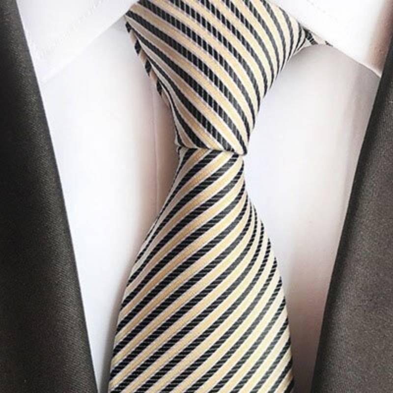 Beżowy krawat w czarne paski
