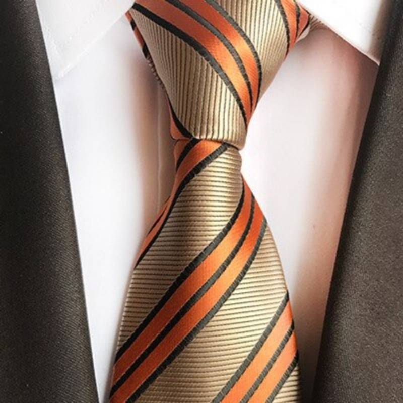 Beżowy krawat w pomarańczowe paski