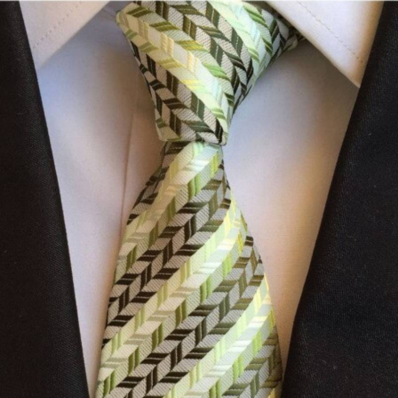 Beżowy krawat w zielone paski