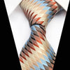 Beżowy krawat w czerwone i niebieskie wzory