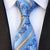 Błękitny krawat w srebrne paski i wzór paisley
