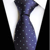 Granatowy krawat w turkusową kropkę
