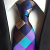 Niebieski krawat w fioletową, beżową i brązową kratkę