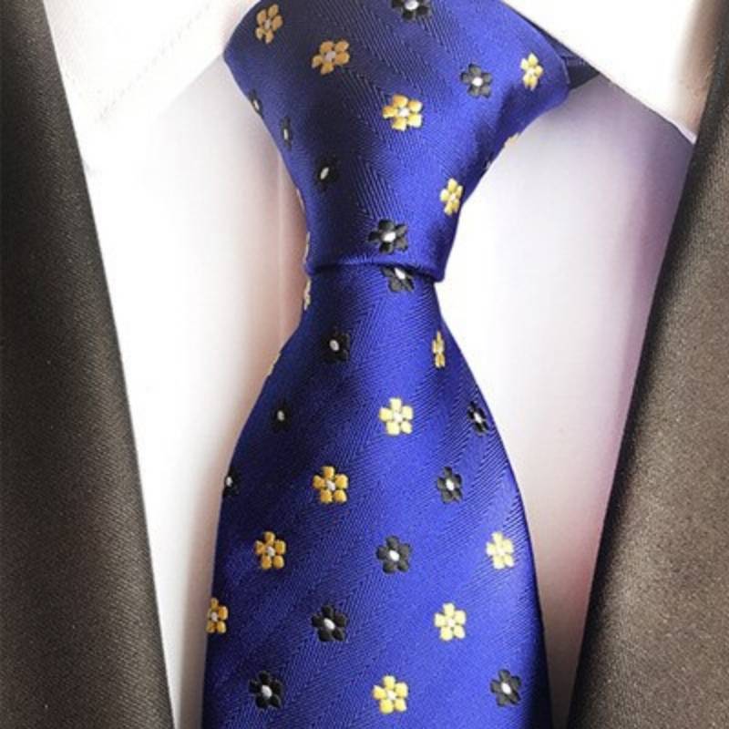 Niebieski krawat w żółte i czarne kwiaty