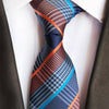 Niebieski krawat w biało-pomarańczowe paski