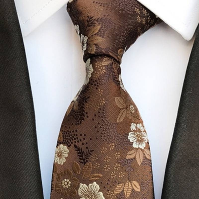 Jasnobrązowy krawat w białe kwiaty