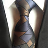 Ciemnoszary krawat w brązowy geometryczny wzór