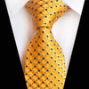 Żółty krawat w czarne kropki