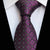 Ciemnofioletowy krawat w białe kropki i rombowy wzór