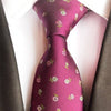 Fioletowy krawat w zielone i różowe kwiaty