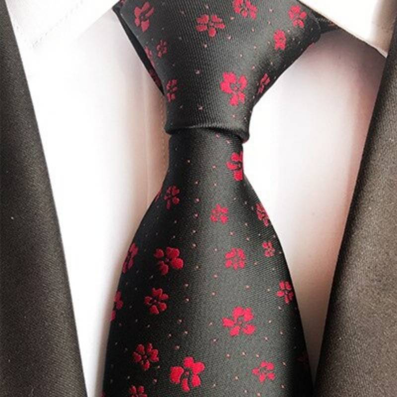 Czarny krawat w czerwone kwiaty i białe kropki
