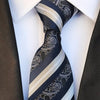 Czarny krawat w białe paski i wzór paisley