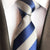 Jasnoszary i ciemnoniebieski krawat w paski