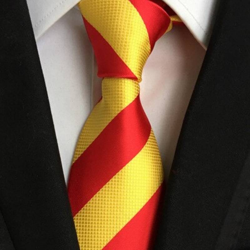 Krawat w żółto-czerwone paski