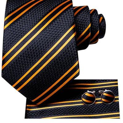 Czarno-złoty krawat w paski w kropki