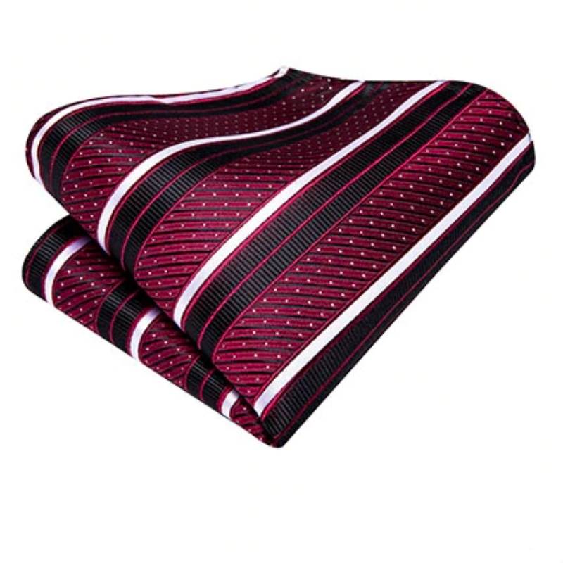 Czerwone kropki, krawat w czarno-białe paski