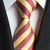 Krawat w czerwono-żółte paski