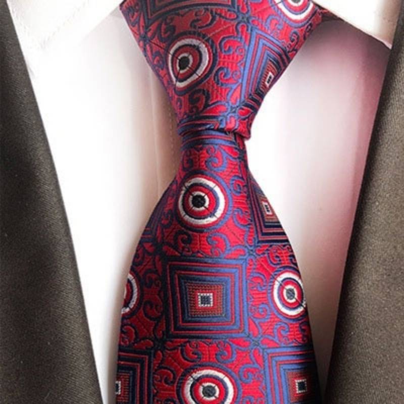 Różowo-niebieski krawat w okrągły i kwadratowy wzór