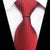 Czerwony krawat w szachownicę i małe białe kropki