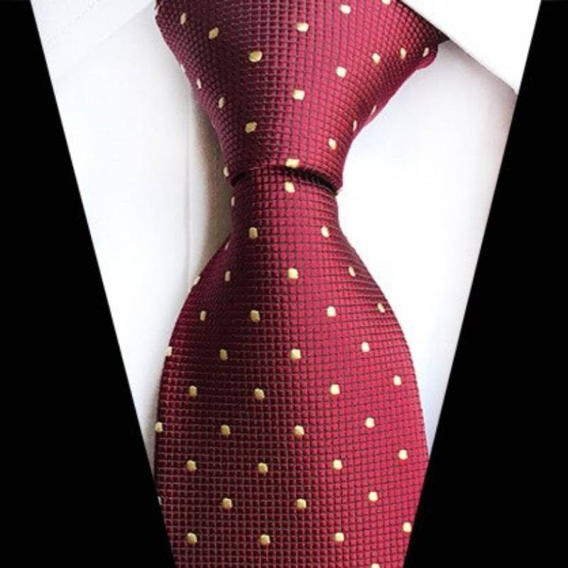 Czerwony krawat w żółte kropki