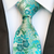 Zielony krawat w turkusowo-niebieskie kwiaty