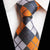 Krawat w biało-pomarańczowo-szarą kratę