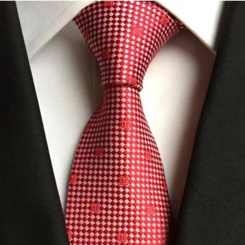 Krawat w czerwono-białe kropki i czerwony wzór
