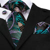 Wzorzysty krawat w kolorze czarnym, zielonym, różowym i beżowym