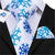Biały krawat z niebieskim płatkiem śniegu