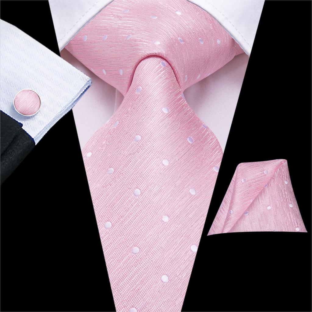 Różowy krawat w białe kropki