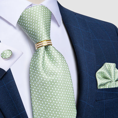 Zielony krawat w białe kropki