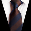 Ciemnoniebieski krawat w brązowe paski